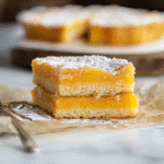 Orange Bars Recipe – A Zesty Dessert You’ll Love 2 saskdev 98455 httpss.mj .runOg0Lih3UwHY Close up amateur photo 0e97dae3 af08 4e1d 9969 f083066d93c4 1